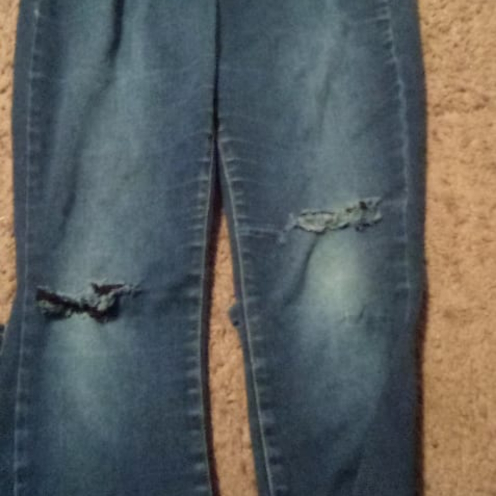 Ripped Knee Jeans